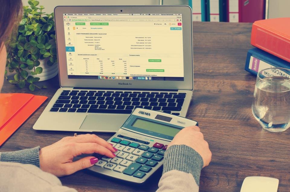 Tax documents and calculator on a desk for Nigerian freelancer tax filing