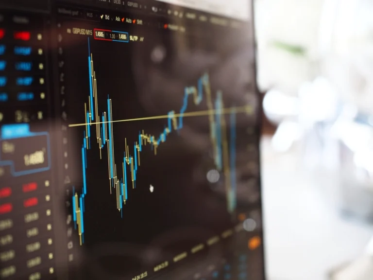 Investment growth chart on a screen for Nigerian freelance investors