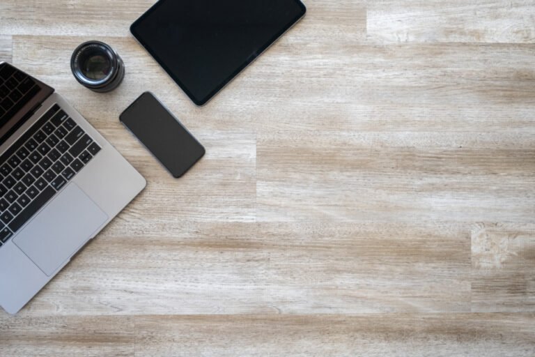 Freelancer comparing Upwork, Fiverr and Freelancer.com on a laptop