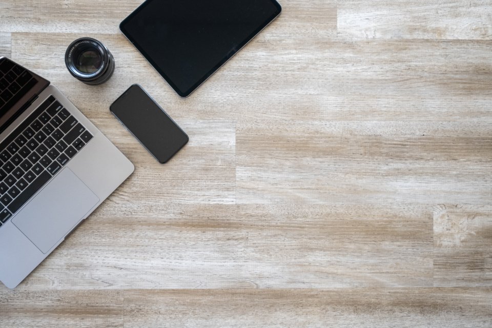 Freelancer comparing Upwork, Fiverr and Freelancer.com on a laptop